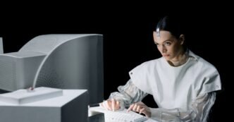 A woman in a futuristic setting working on an old computer, suggesting a blend of past and future.