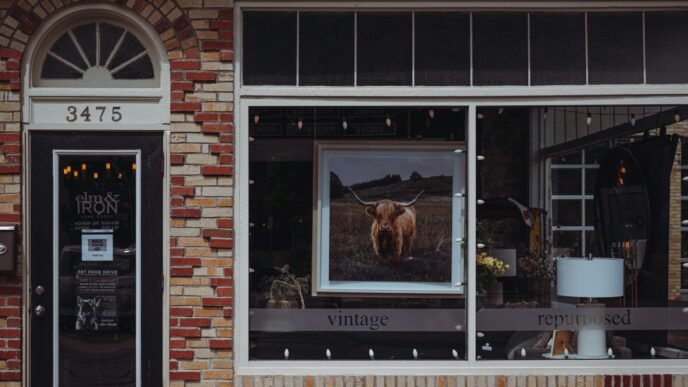 A picturesque vintage café storefront with a brick facade, featuring unique decor and signage.